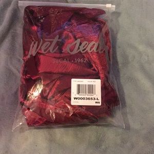 Niki and Gabi wetseal Satin tangled wrap romper